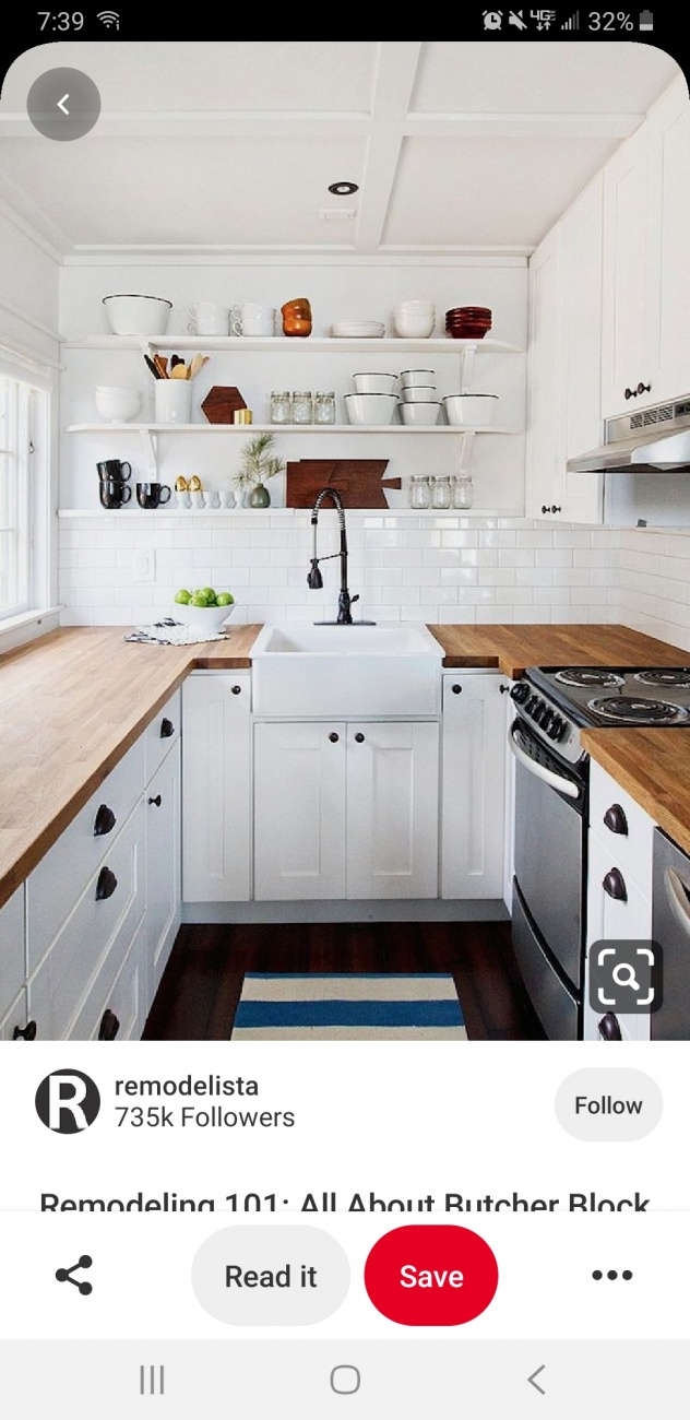 Counter, cabinets, sink, shelves, bac...
