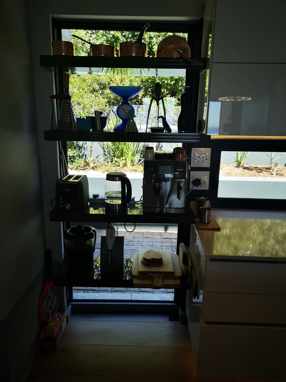 Floating shelving over the window
