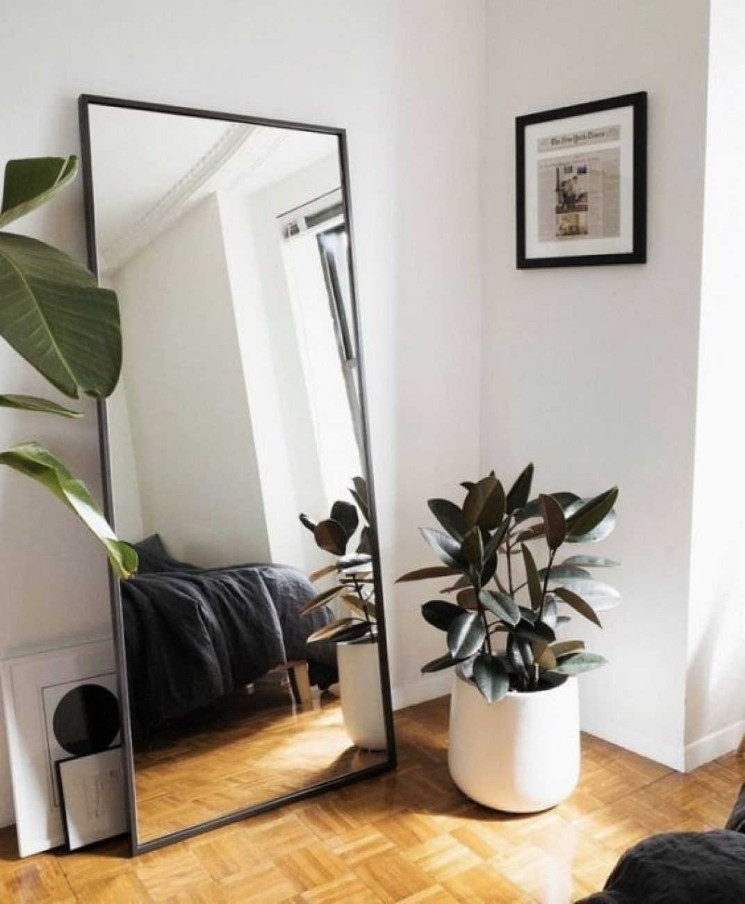 Large stand alone mirror towards  foo...