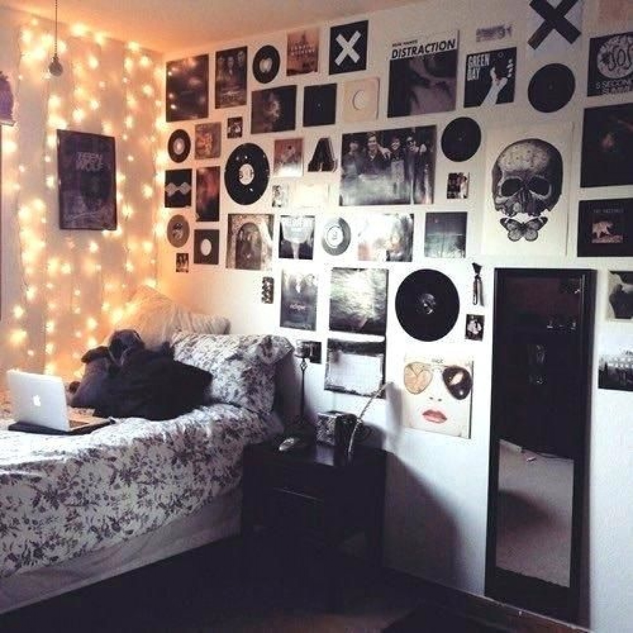 Posters on wall, in frames, maybe viy...
