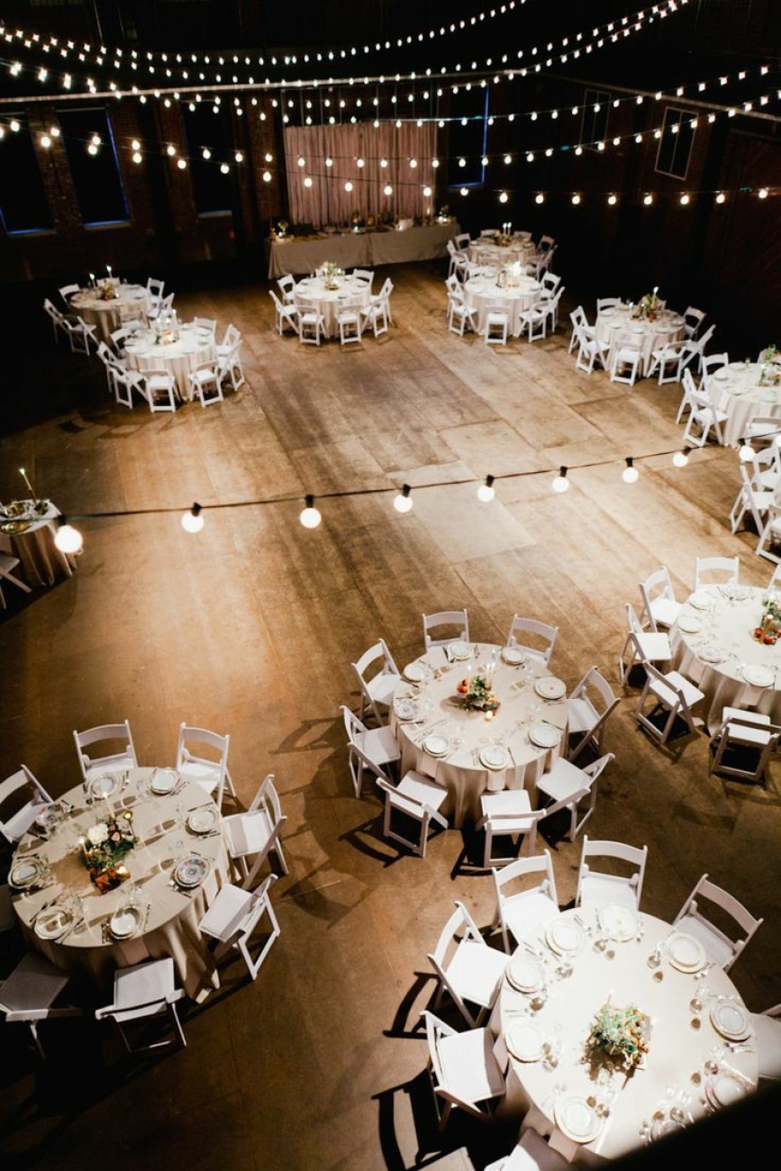 Round tables all white with lighting 