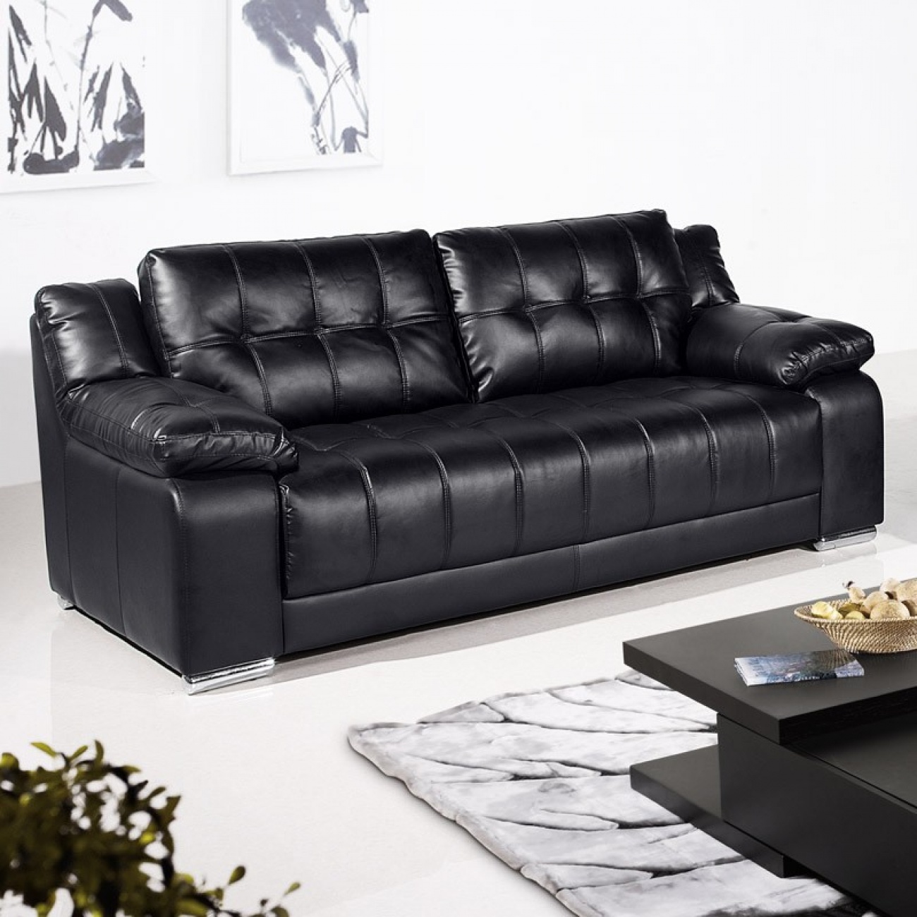 This sofa is black and leather so if ...